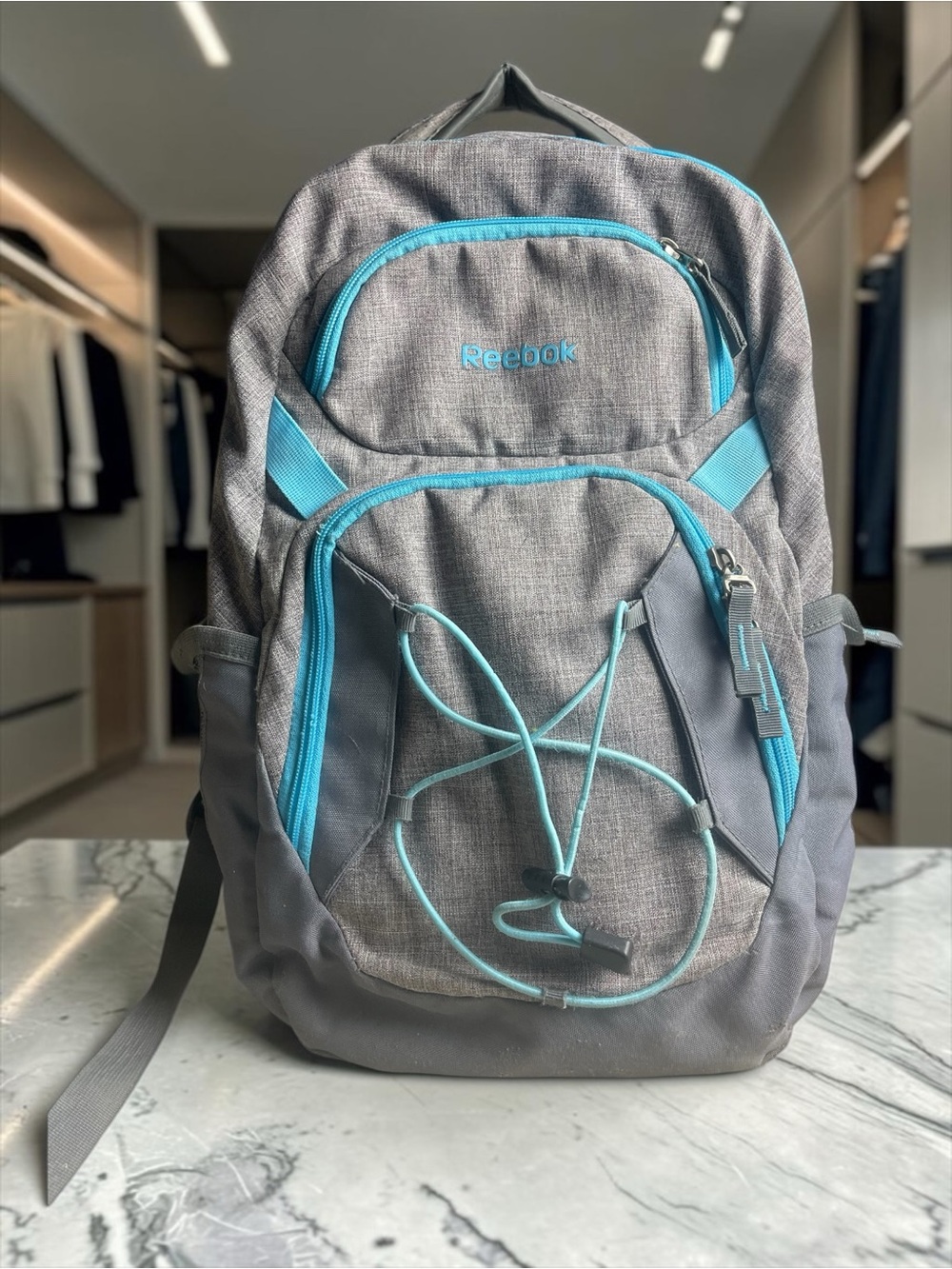 Reebok Gray Backpack with Teal Accents